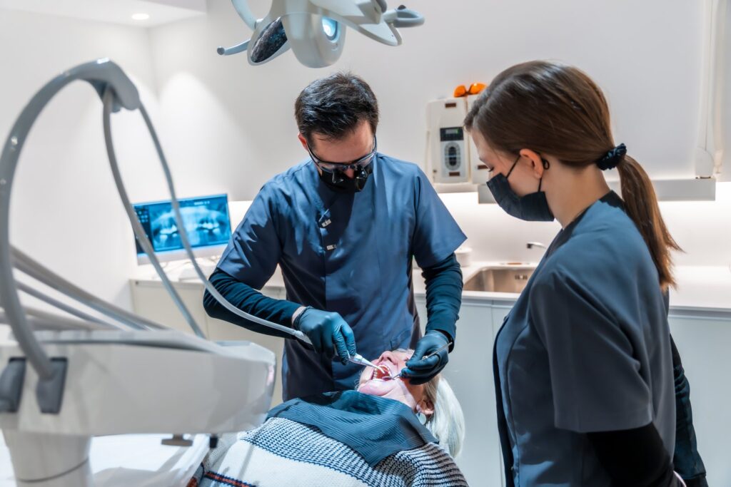 Dental exam with two healthcare professionals assi, Tijuana