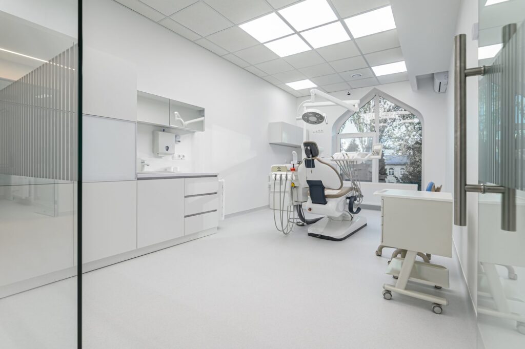 White dental office with glass doors