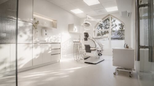 AI render of a bright white dental office with a large window