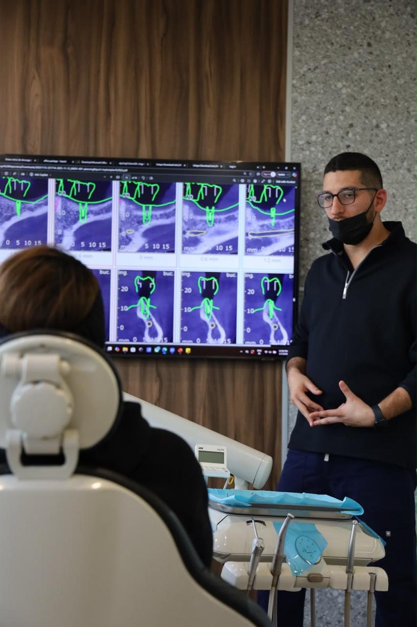 CBCT imaging reviewed with a patient at Makeover Dental Studio