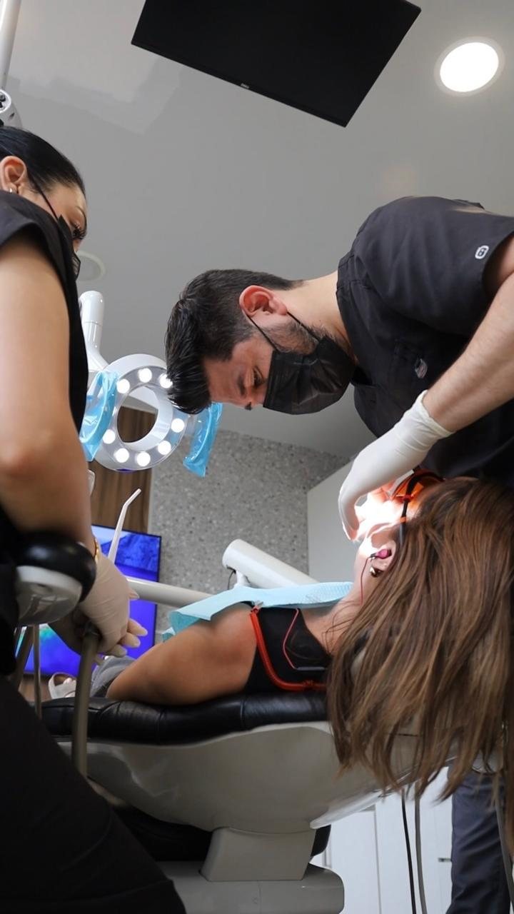 Clinical team working together at Makeover Dental Studio in Tijuana