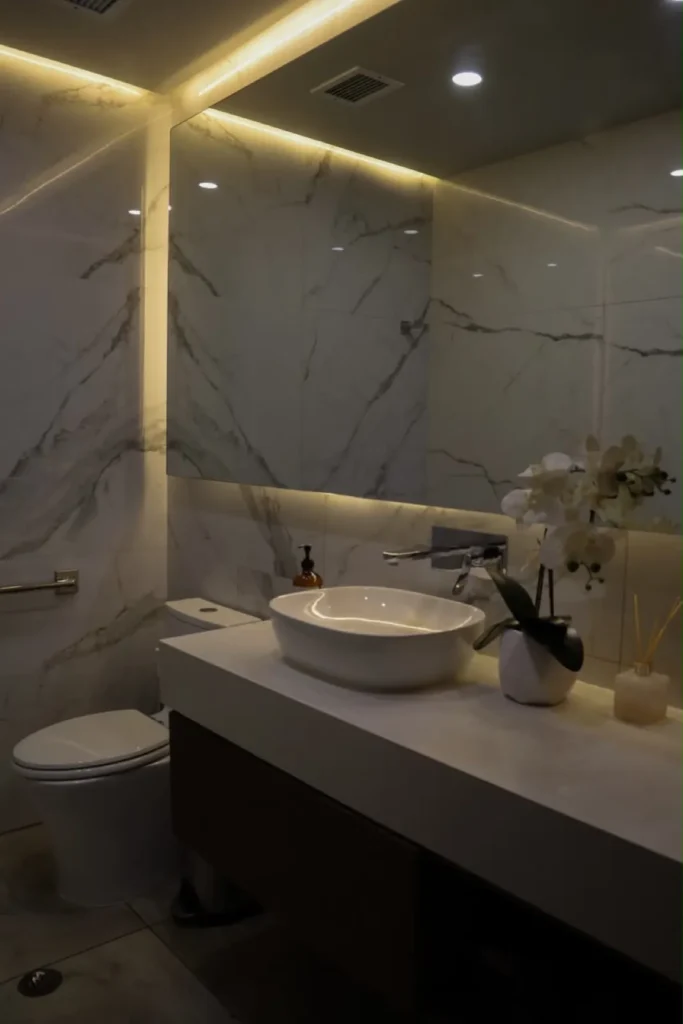 Marble patient restroom at Makeover Dental Studio in Tijuana