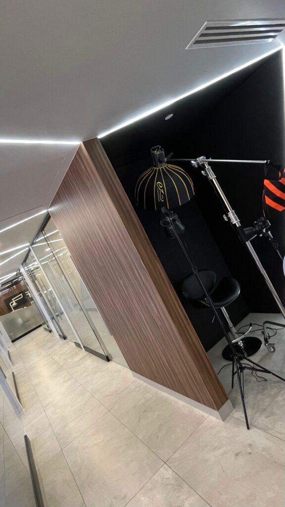 Hallway leading to the in-house photo studio at Makeover Dental Studio